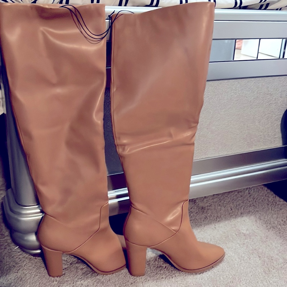 Brand new. My calf’s are too big lol